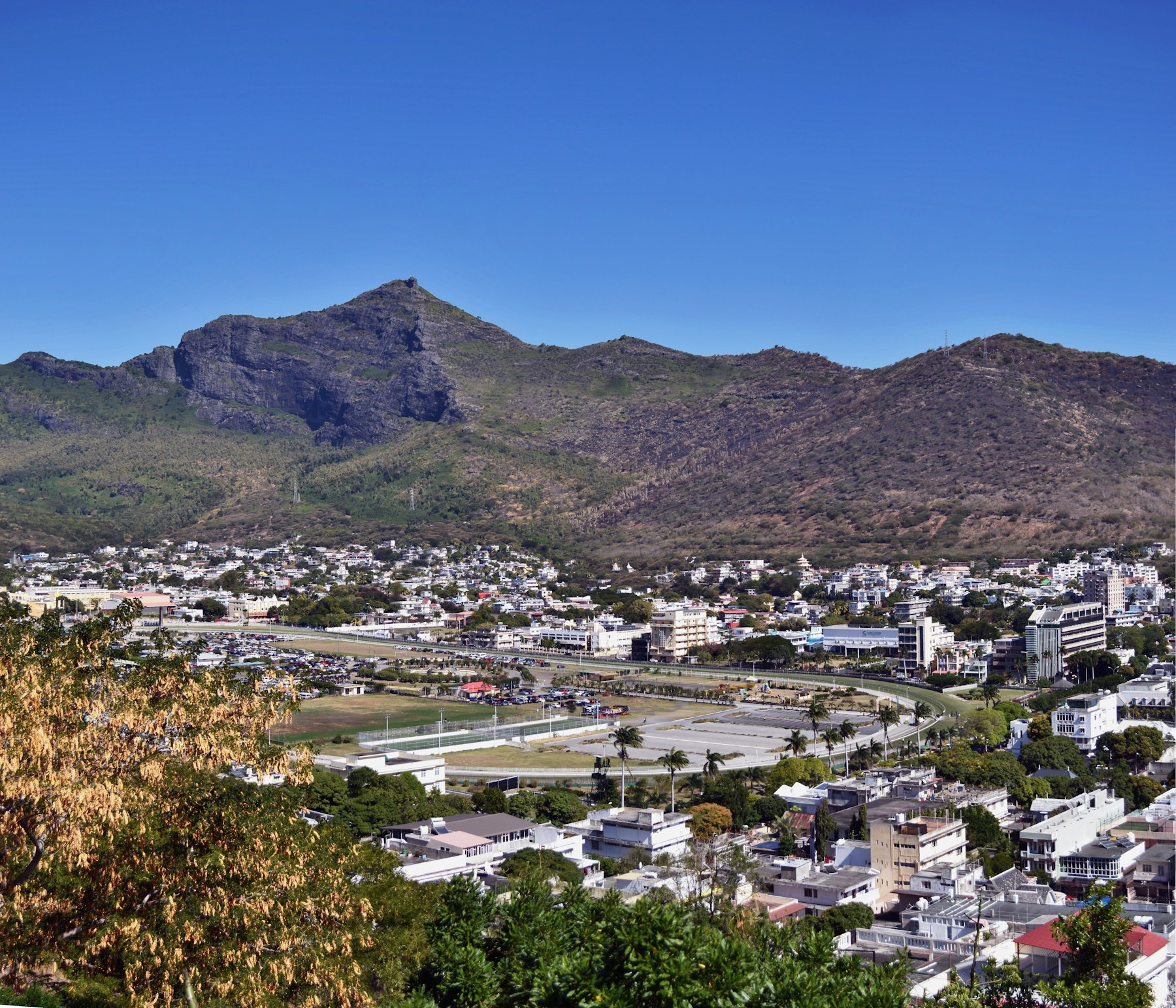 Mauritian town below the mountains of the Moka range